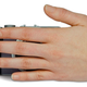 Illustration for article titled Olympus E-P3 Spied Behind Rudely-Placed Hand of Leaked Campaign